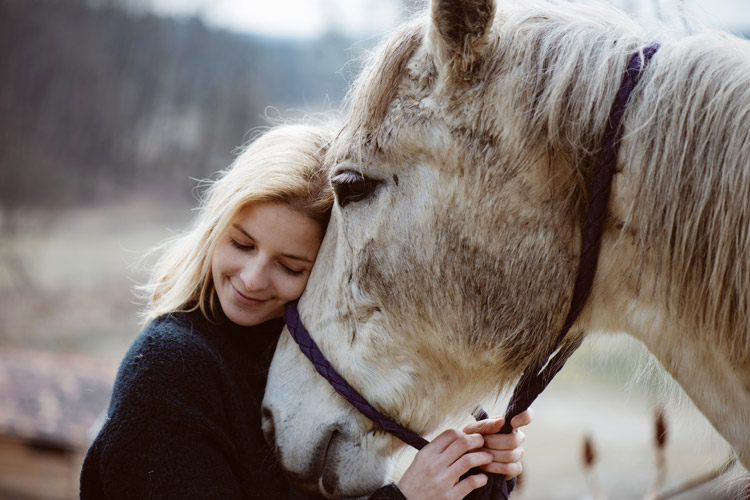 WomanWithHorse_750x500